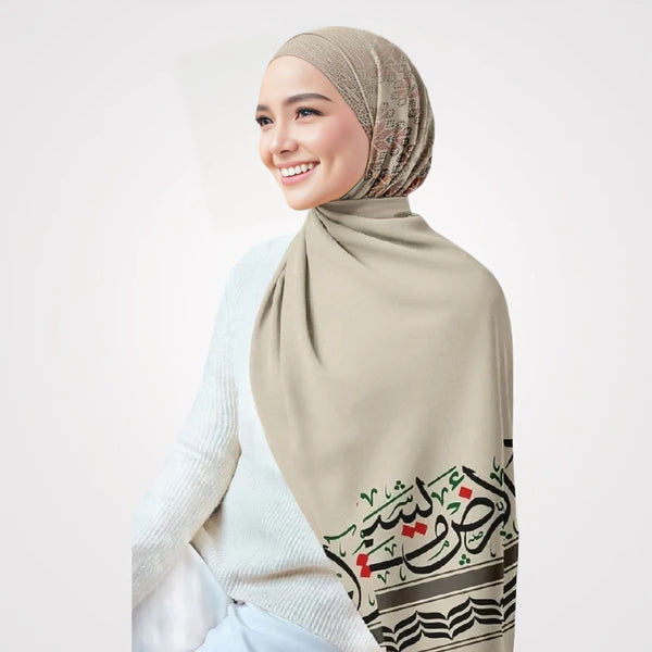"Printed Beige Scarf with Arabic Calligraphy - Soft digital chiffon material, generously sized for versatile styling. This elegant beige scarf combines Arabic print with a traditional keffiyeh pattern, featuring artistic Arabic calligraphy for cultural richness."