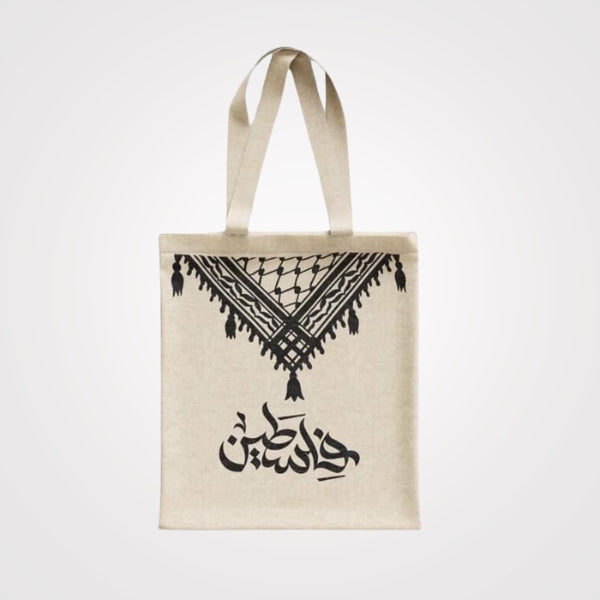 Heavy-Duty Canvas Tote Bag featuring the phrase 'On this earth what is worth living.' Designed with 'Palestine' and a keffiyeh pattern."
