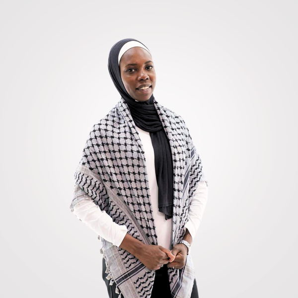 "A traditional Palestinian shawl in white and black, featuring intricately woven or embroidered Palestinian patterns with white and black threads. These patterns include complex geometric or floral designs symbolizing cultural heritage and craftsmanship. Made from cotton, the Palestinian shawl embodies cultural pride and timeless elegance."